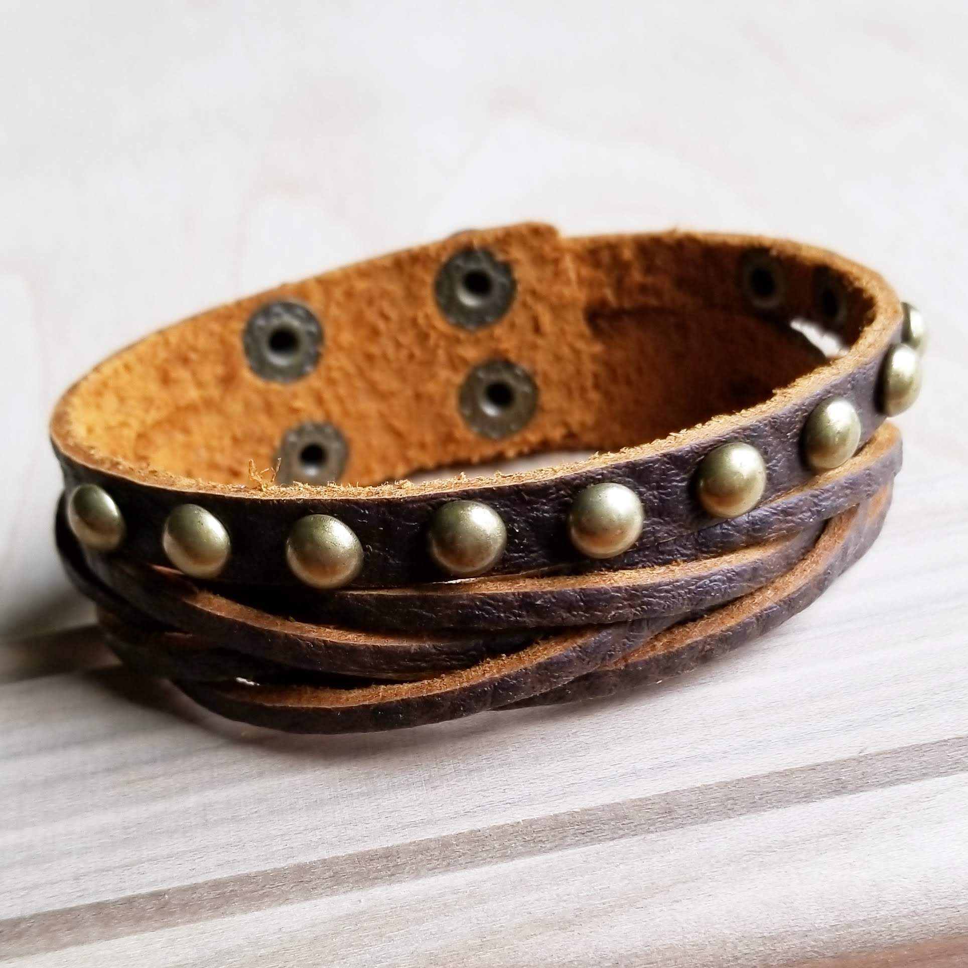 Brown leather bracelet with gold studs