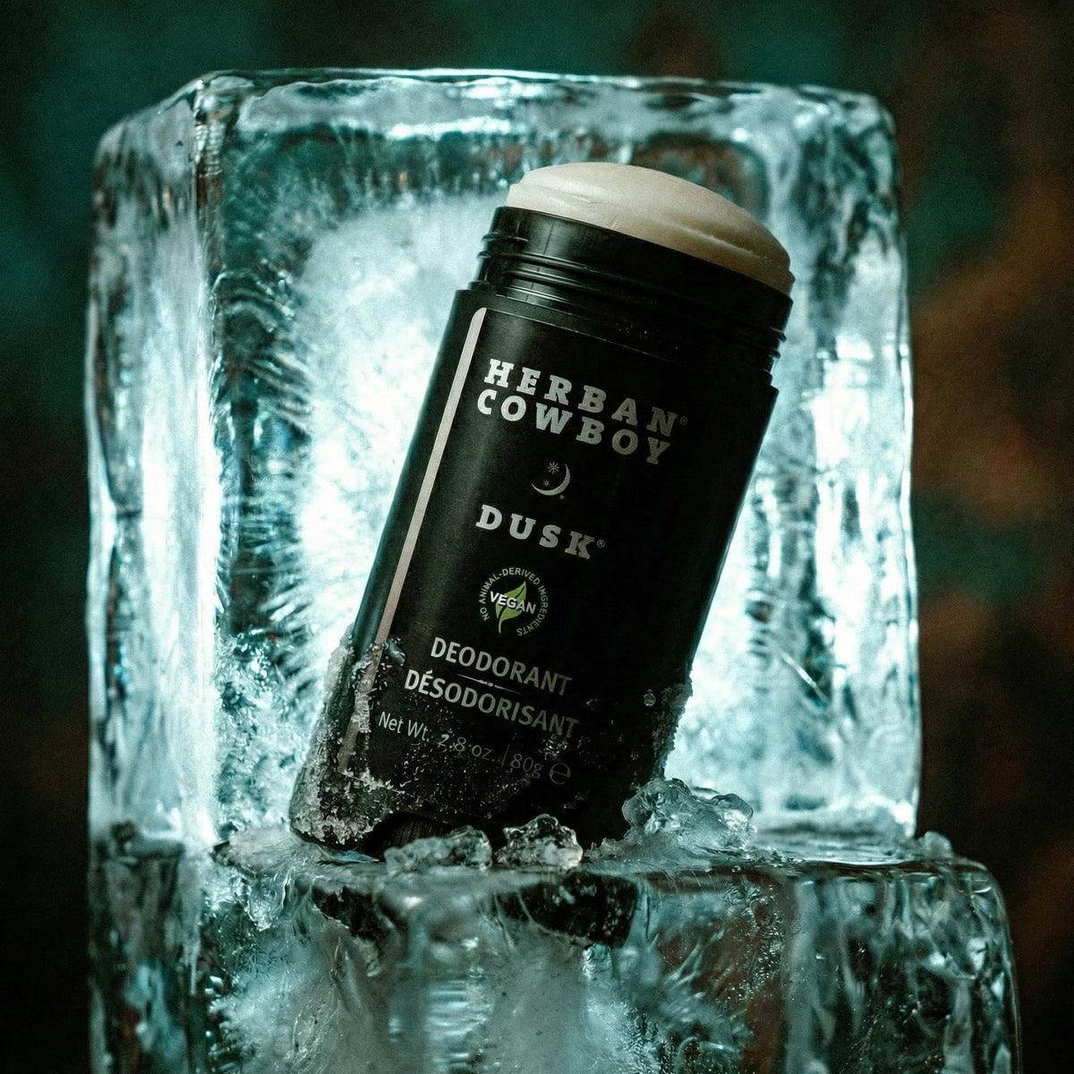 Herban Cowboy Dusk deodorant stick in a block of ice