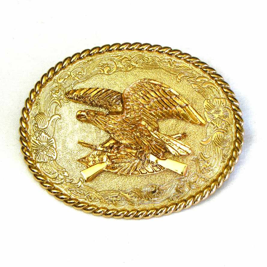 Gold belt buckle with an eagle design